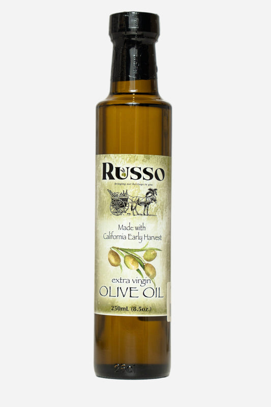 Bottle of Russo extra virgin olive oil on a white background
