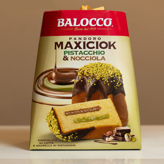 Balocco Maxiciok Pistacchio & Nocciola packaging on a reflective surface with a neutral background
