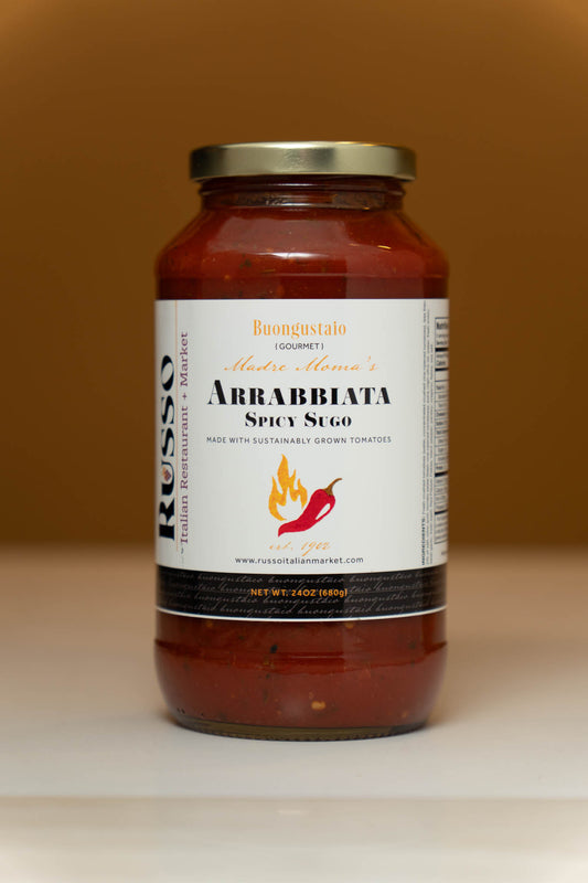Jar of Russo Arrabbiata Spicy Sugo pasta sauce on a beige background