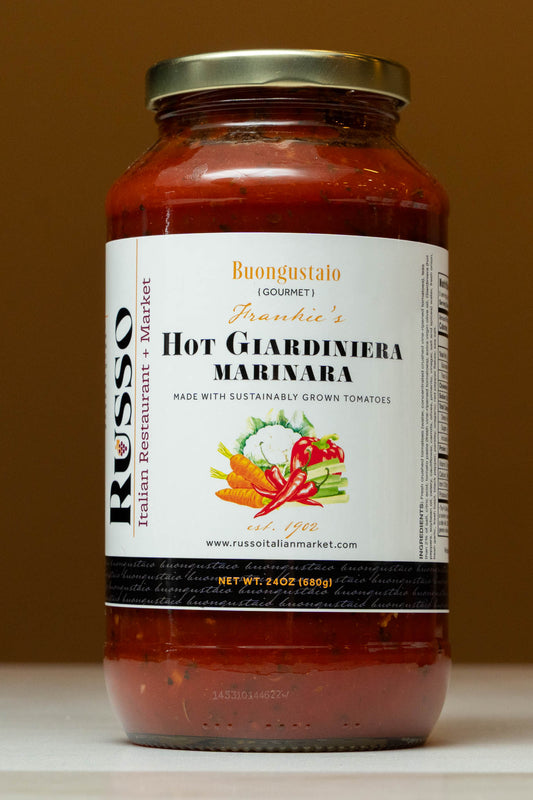 Jar of Hot Giardiniera Marinara with label on a brown background