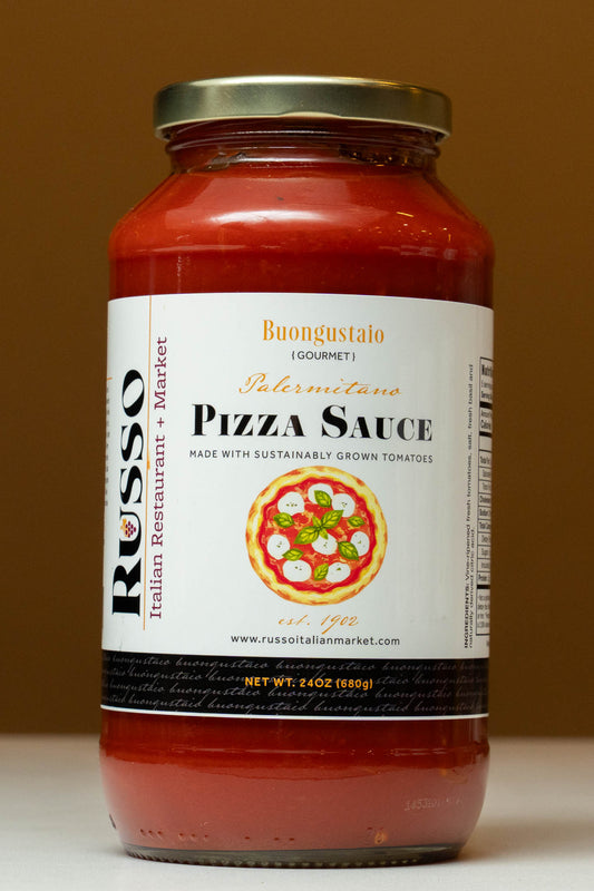 Jar of pizza sauce with a label on a brown background