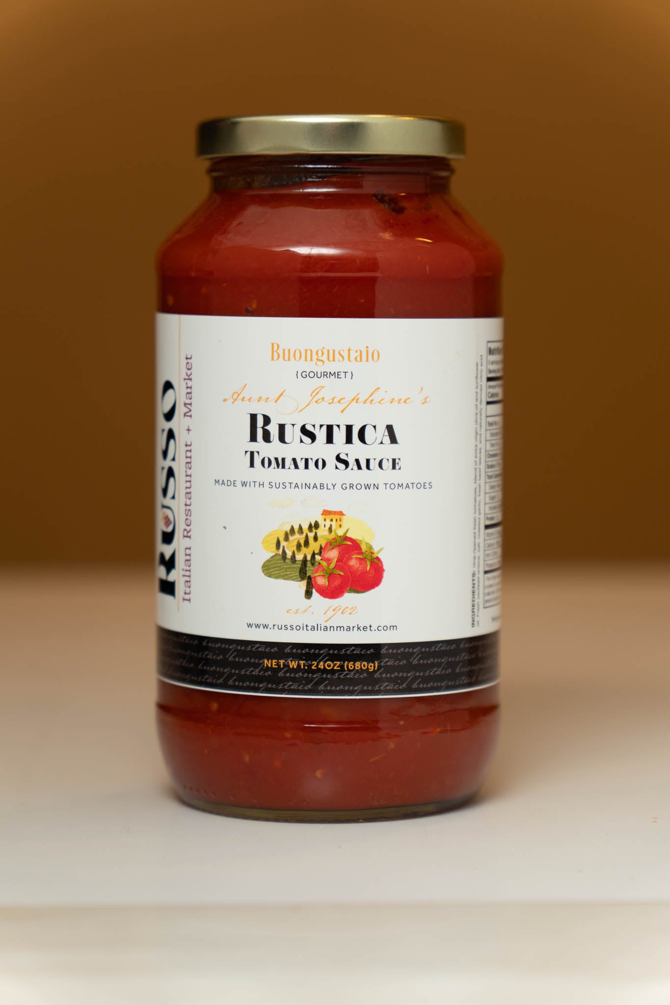 Jar of Russo Rustica Tomato Sauce on a beige background