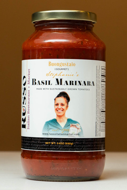 Jar of Buongustao Stephanie's Basil Marinara sauce with a label featuring a woman on a brown background